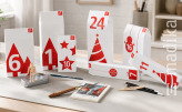 Adventskalender Häuschen aus Beutelschachteln für Bastelbedarf