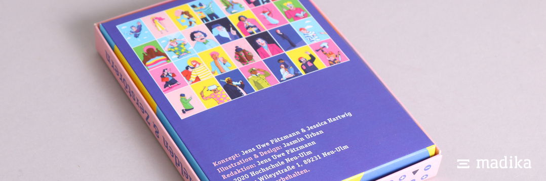 Rückseite einer bunt bedruckten Stülpschachtel gekrempelt. Rückseite eines bunt bedruckten Stülpkartons mit gekrempelten Seitenwänden von madika.de