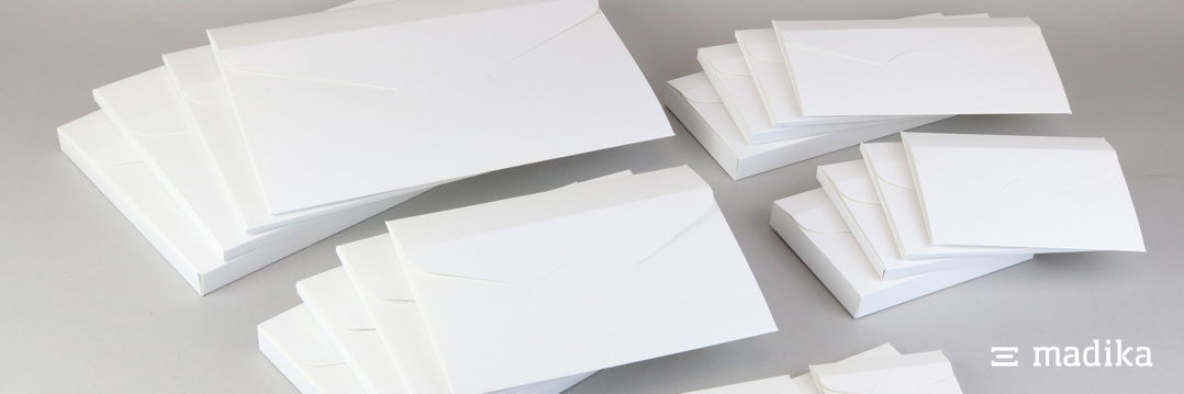 Steckmappen in verschiedenen Größen aus weißem Chromokarton. Steckmappen in verschiedenen Größen aus weißem Chromokarton