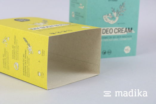 Karton-Banderolen aus Graskarton mit frisch-fröhlicher Bedruckung. Graspapier Banderole bedruckt