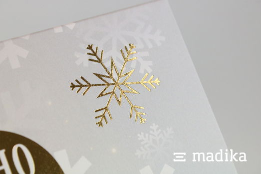 Veredelte Pralinenverpackung mit goldener Heißfolie im weihnachtlichen Design Veredelte Pralinenverpackung mit goldener Heißfolie
