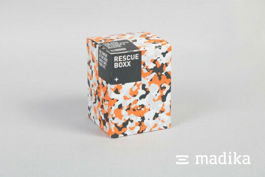 Eine Faltschachtel mit buntem Design und Aufdruck Eine Faltschachtel mit buntem Design und Aufdruck