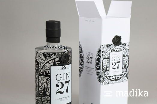 Eine schwarz-weiße Faltschachtel für Gin Eine schwarz weiß Faltschachtel für einen Gin