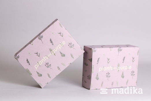Rosa bedruckte Faltschachtel aus Graspapier Rosa bedruckte Faltschachtel aus Graspapier