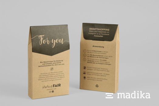 Zwei Beutelschachteln aus Naturkarton mit schwarzer Bedruckung Zwei Beutelschachteln aus Naturkarton mit schwarzer Bedruckung