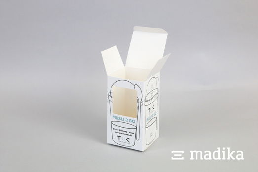 Eine weiße Faltschachtel to go mit Sichtfenster Eine weiße Faltschachtel mit Sichtfenster in Kleinauflage