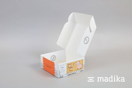 Gekrempelte Klappschachteln werden auf Wunsch aufgebaut geliefert. Klappschachtel gekrempelt mit Bedruckung für Spielzeug