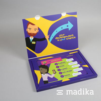 Eine Klappschachtel von madika.de im 60er-Jahre-Stil mit geschwungenen Linien. madika-Klappschachtel 60er-Stil