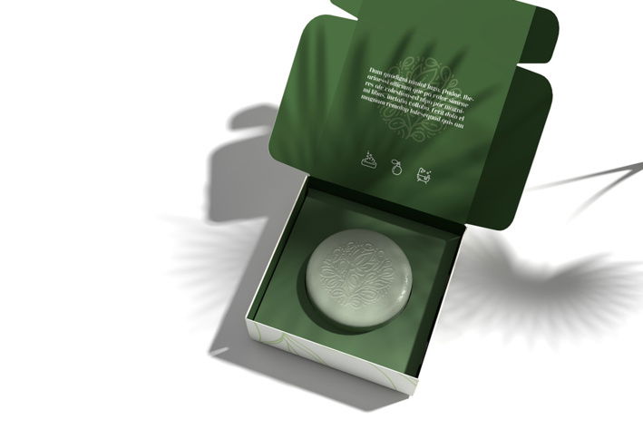 Die Klappschachtel wurde auch innen bedruckt, um einen schönen Öffnungseffekt zu erzielen. Grüne Klappschachtel als Verpackung für Seife