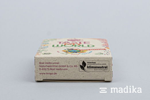 Klimaneutral gedruckte Faltschachtel aus Graspapier. Klimaneutral gedruckte Graspapierverpackung.