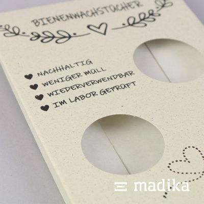 Diese nachhaltige Produktverpackung wurde mit runden Sichtfenstern ausgestattet Nachhaltige Verpackung aus Graspapier