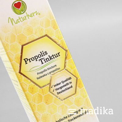 Faltschachtel mit goldener Heißfolienprägung in Wabenform Faltschachtel mit goldener Heißfolienprägung