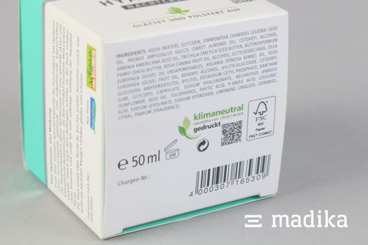 Neben dem dem Grünen Punkt findet sich hier auch das FSC-Zeichen sowie der Hinweis auf den klimaneutralen Druck. Faltschachtelboden mit verschiedenen Symbolen und Logos