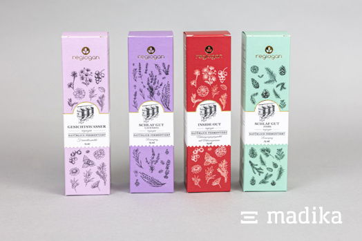 Faltschachteln in vier Sorten mit goldener Heißfolie 4 Faltschachteln mit unterschiedlicher Bedruckung und goldener Heißfolienprägung